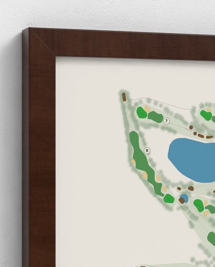 The mitred corner of a Brown classic frame, close up, over a course print